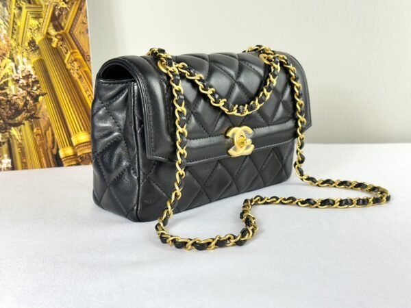 Chanel 25P Black Lambskin Flap Bag.