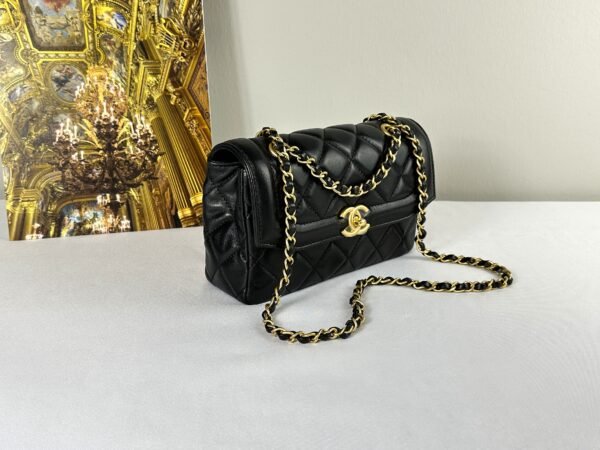 Chanel 25P Black Lambskin Flap Bag.