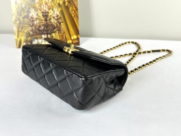 Chanel 25P Black Lambskin Flap Bag.
