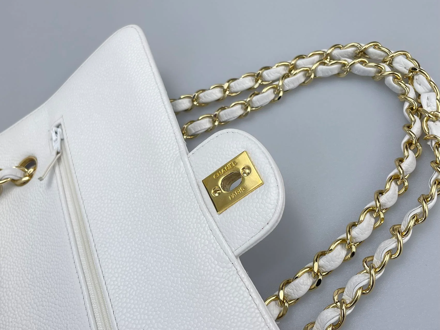 used-Chanel Medium White Classic Flap Bag in Caviar Leather with Gold Hardware-MILOURA