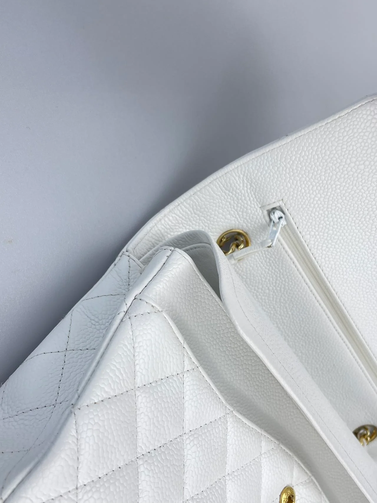 used-Chanel Medium White Classic Flap Bag in Caviar Leather with Gold Hardware-MILOURA