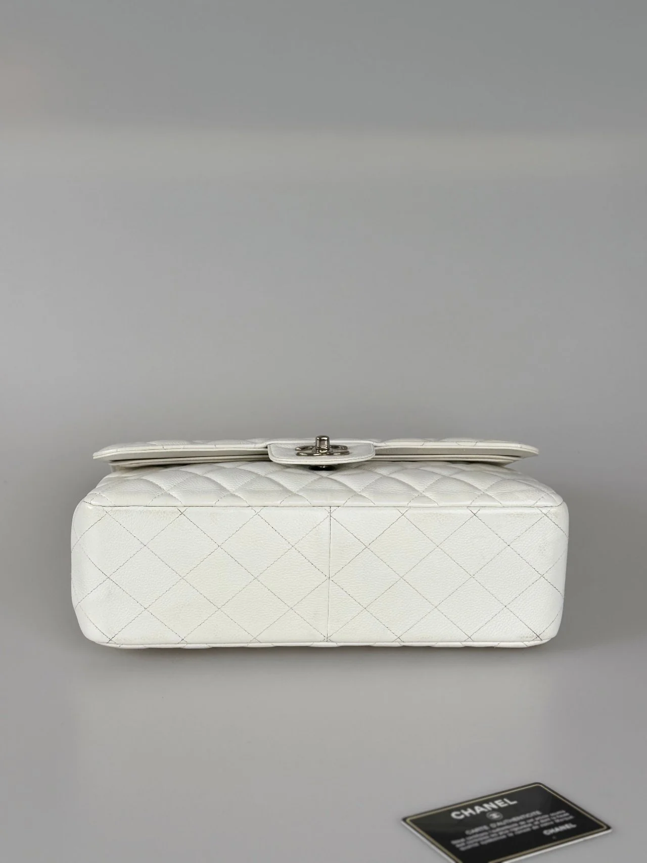 used-Chanel White Jumbo classic Double Flap Bag In Caviar Leather with silver Hardware-MILOURA
