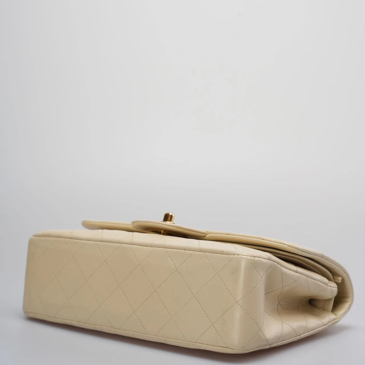 used-Chanel Vintage Beige Quilted Leather small timeless Double Flap Bag with 24K Gold Hardware-MILOURA