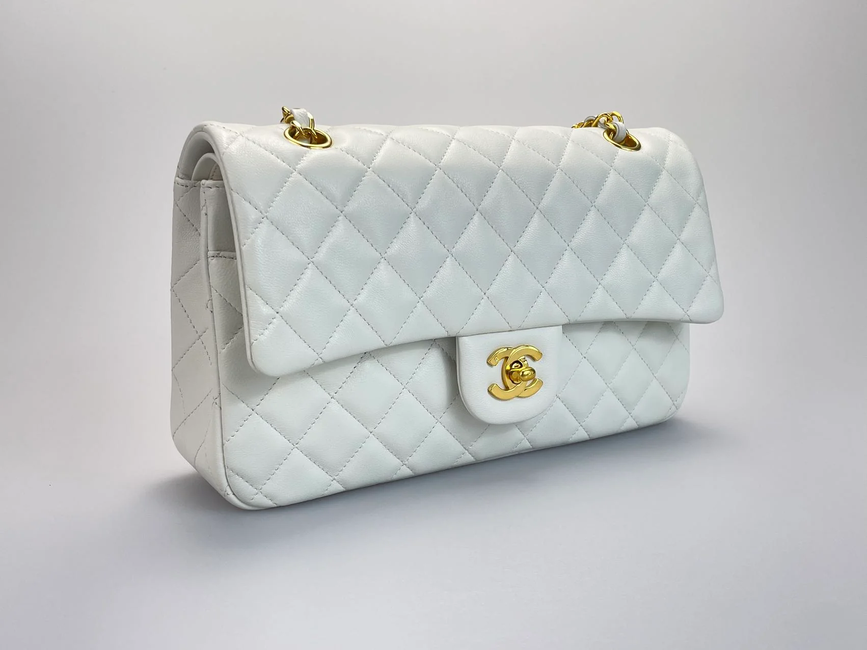 used-Chanel Vinateg White Classic Flap Bag with Gold Hardware-MILOURA