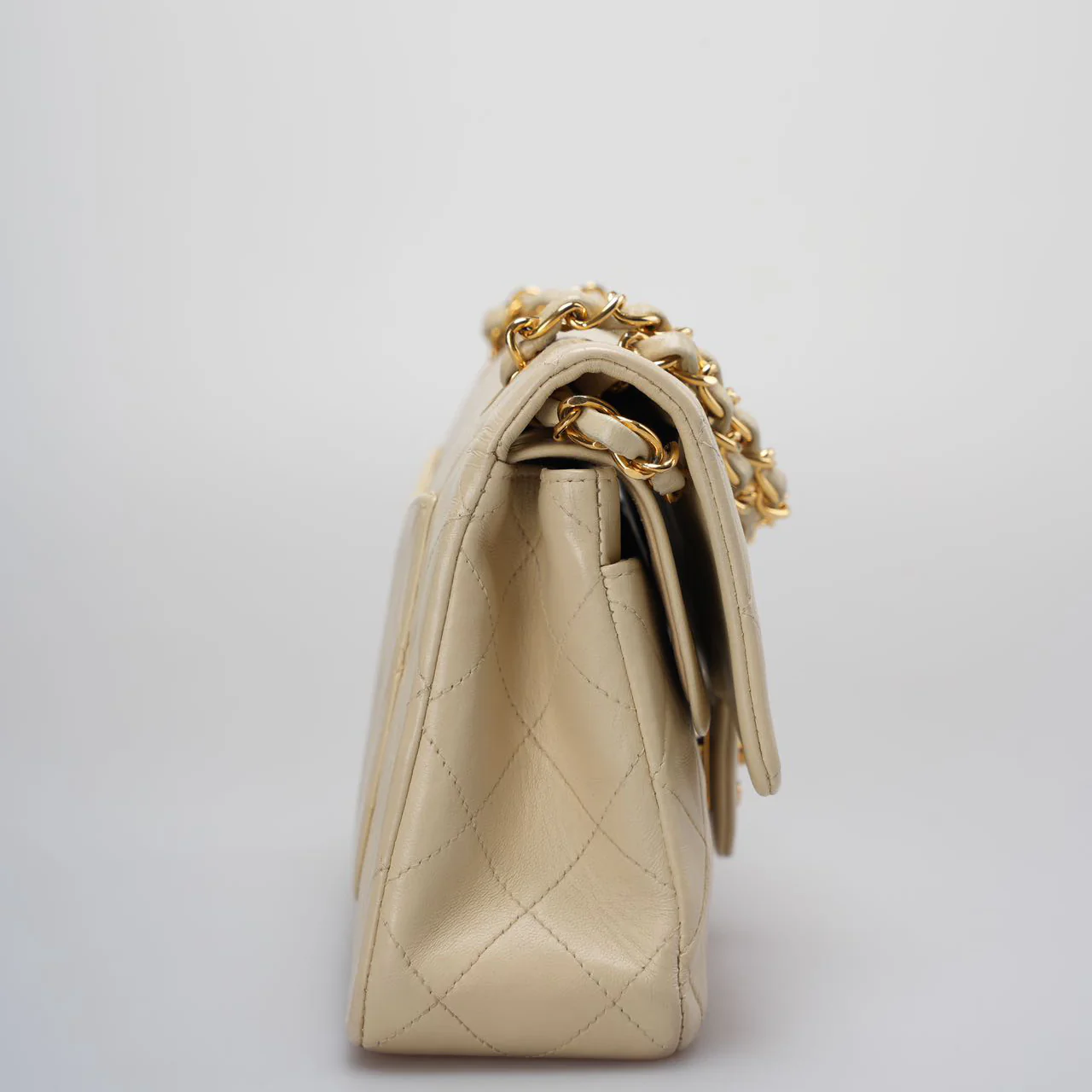 used-Chanel Vintage Beige Quilted Leather small timeless Double Flap Bag with 24K Gold Hardware-MILOURA