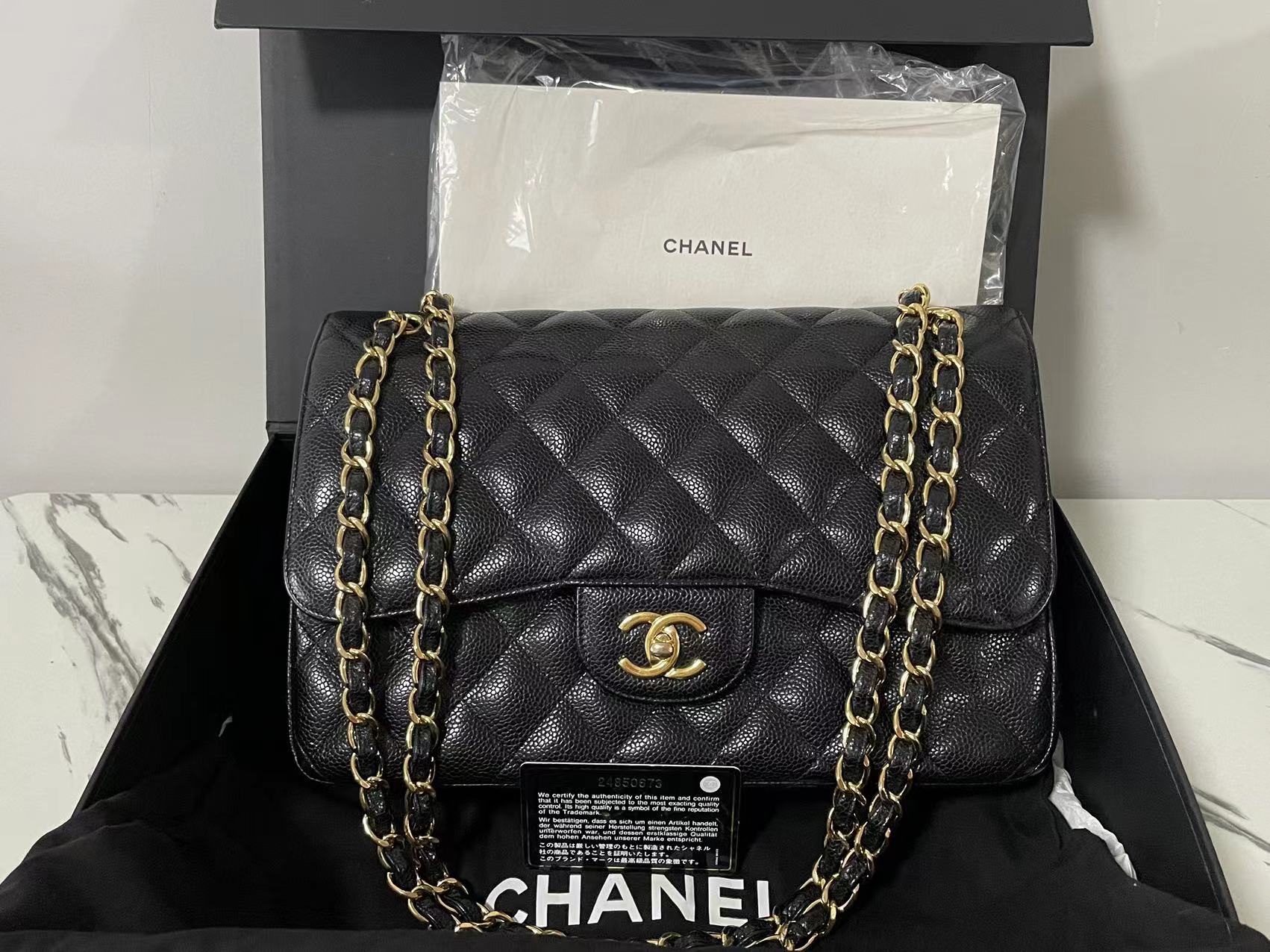 used-Chanel Black Jumbo Classic Double Flap Bag Caviar Leather with Gold Hardware-MILOURA