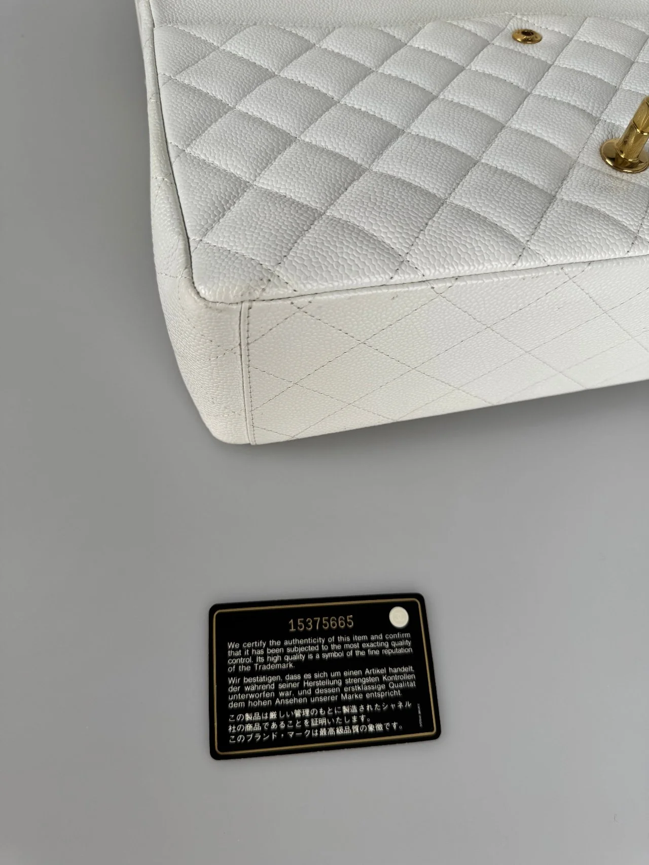 used-Chanel timeless flap Bag Caviar Leather Maxi size in white-MILOURA