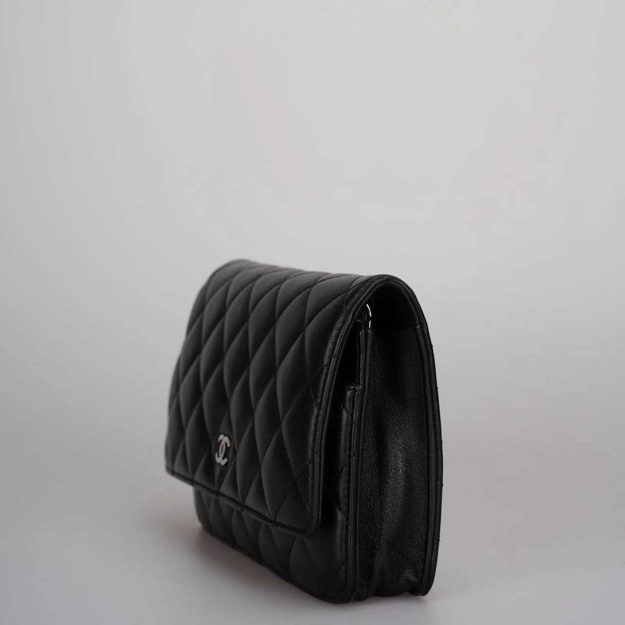 used-Chanel Black Classic WOC Lambskin Leather with Silver Hardware-MILOURA