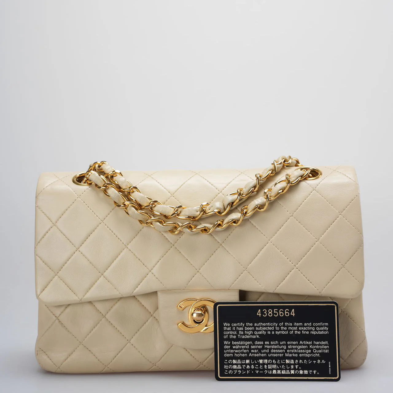 used-Chanel Vintage Beige Quilted Leather small timeless Double Flap Bag with 24K Gold Hardware-MILOURA