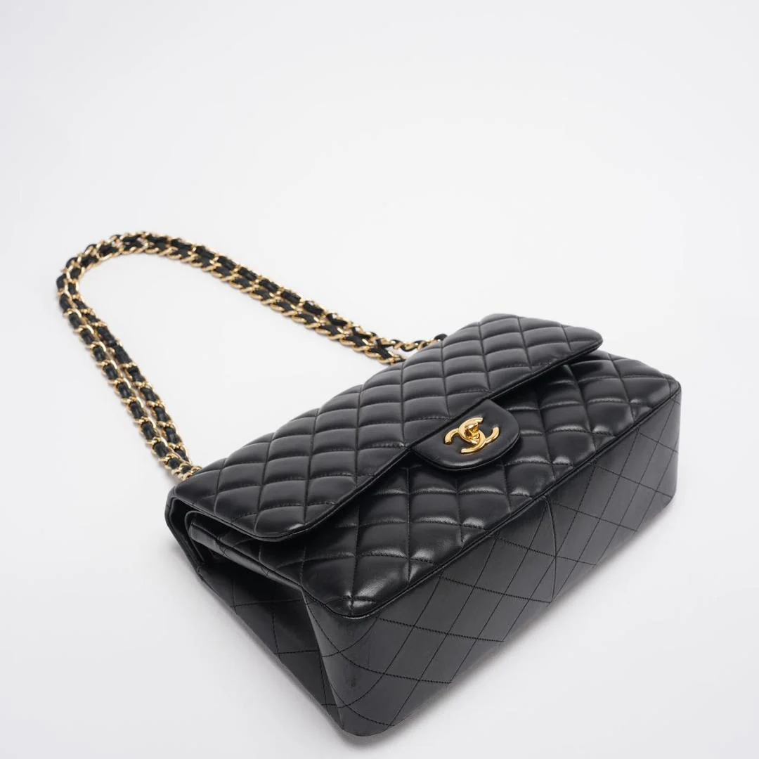 Chanel Timeless Classic Flap  Bag Black Jumbo Quilted Leather Gold Hardware  Corner