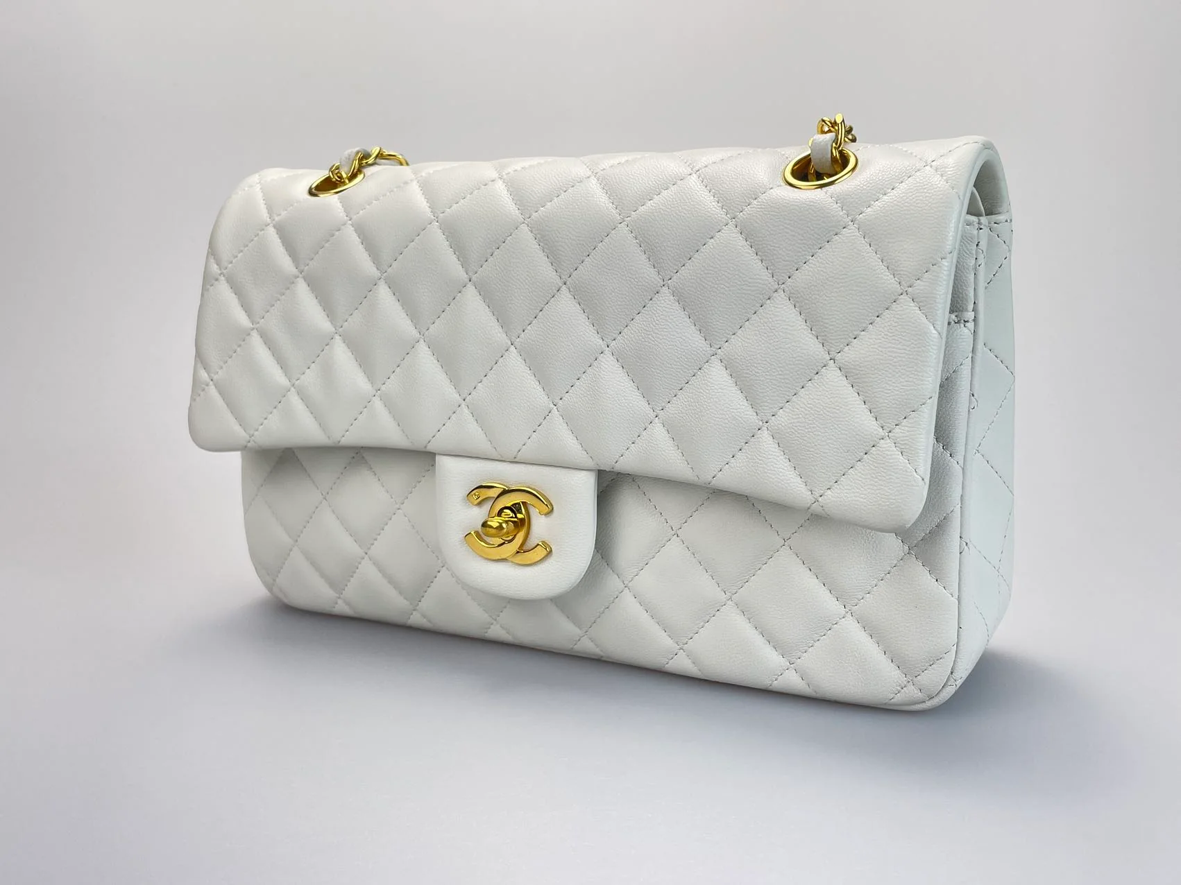 used-Chanel Vinateg White Classic Flap Bag with Gold Hardware-MILOURA