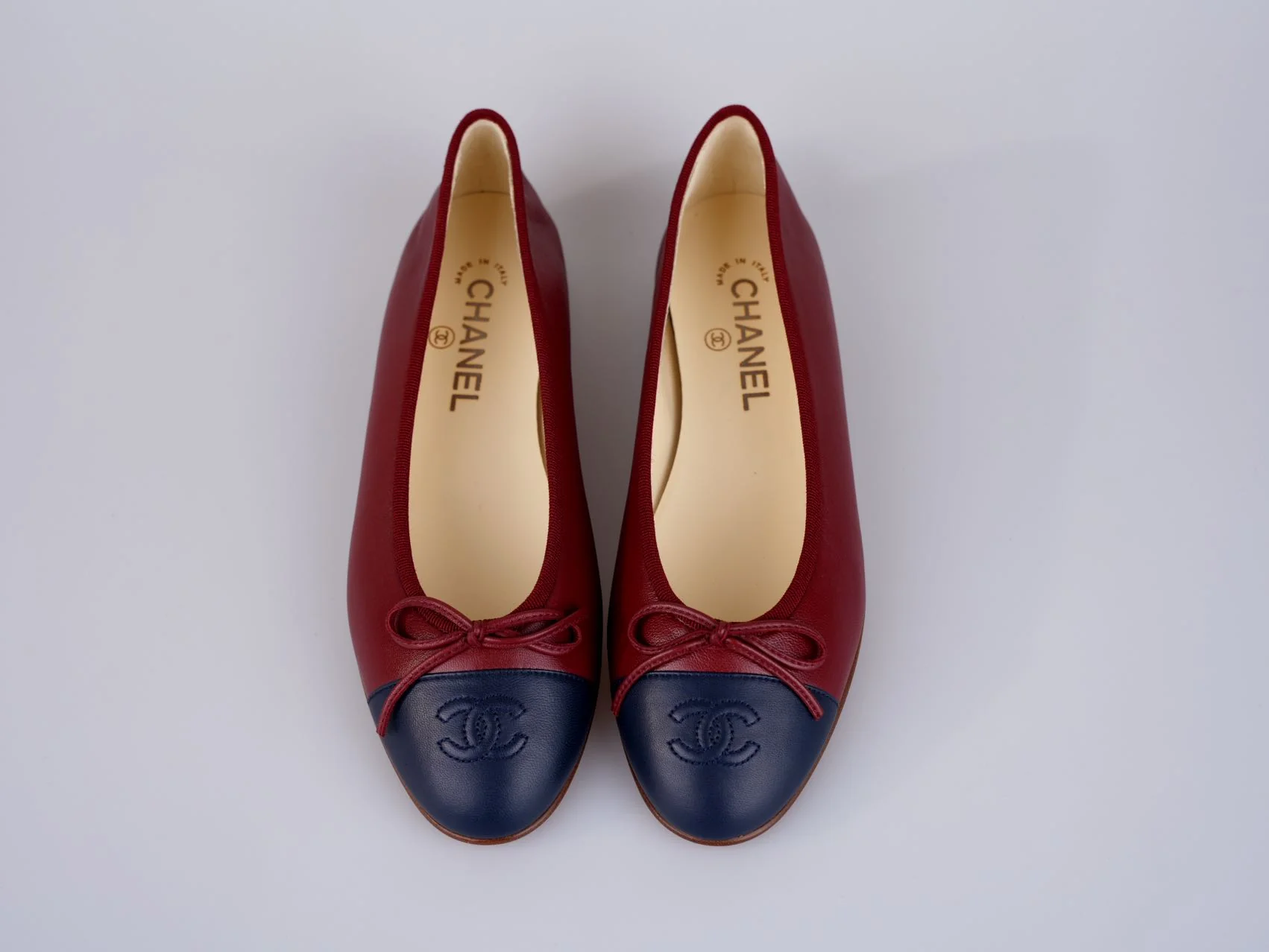 used-Chanel Burgundy Leather CC Bow Cap Toe Ballet Flats Size 38.5-MILOURA