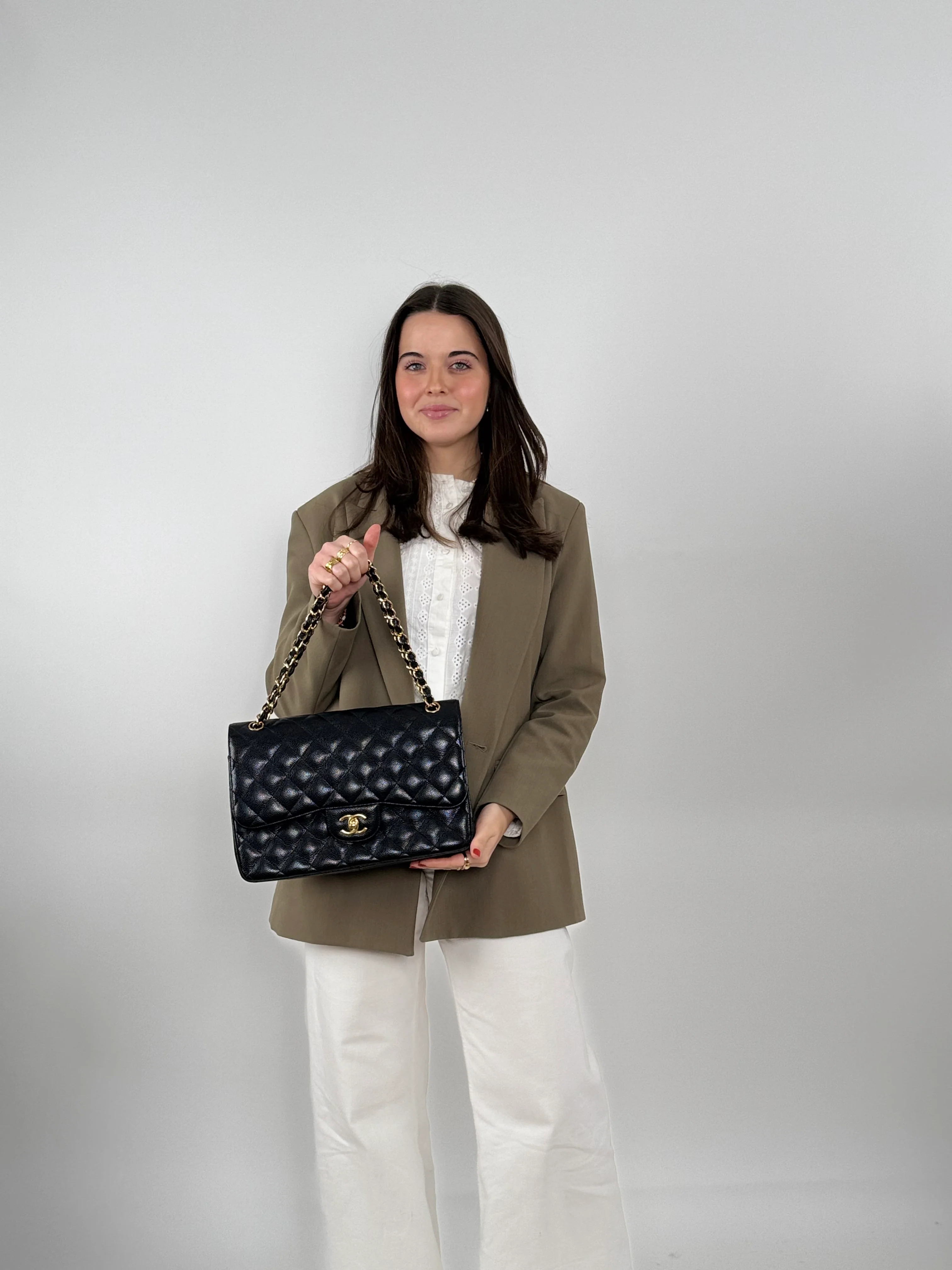 used-Chanel Black Jumbo Classic Double Flap Bag Caviar Leather with Gold Hardware-MILOURA