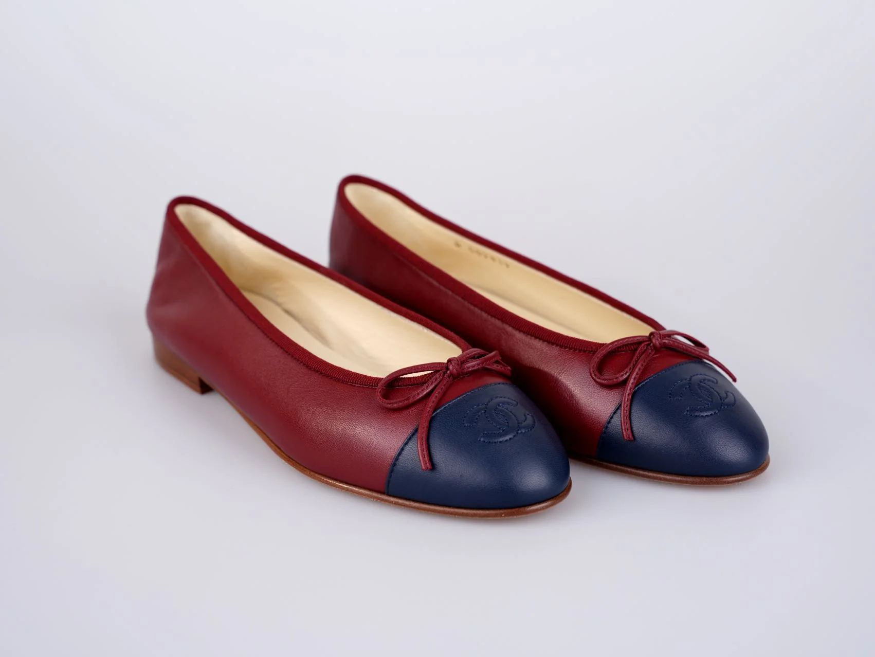 used-Chanel Burgundy Leather CC Bow Cap Toe Ballet Flats Size 38.5-MILOURA