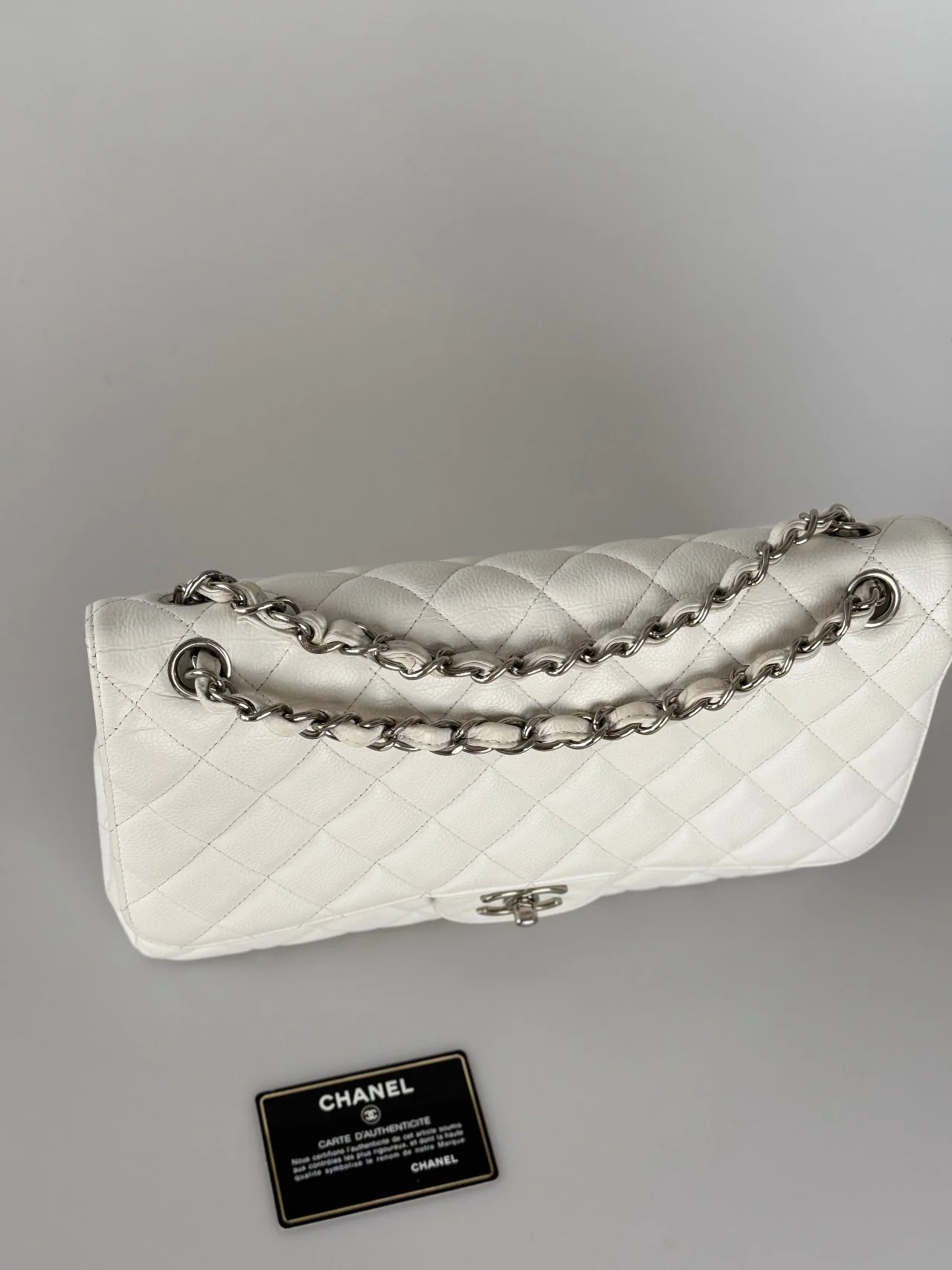 used-Chanel White Jumbo classic Double Flap Bag In Caviar Leather with silver Hardware-MILOURA