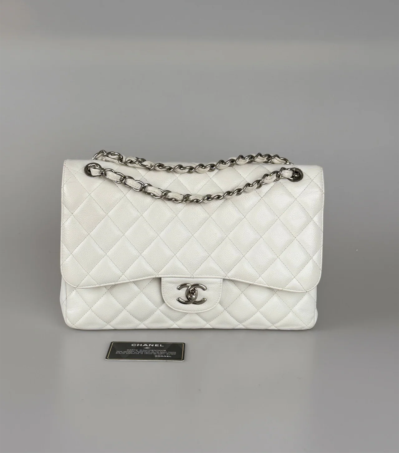 used-Chanel White Jumbo classic Double Flap Bag In Caviar Leather with silver Hardware-MILOURA