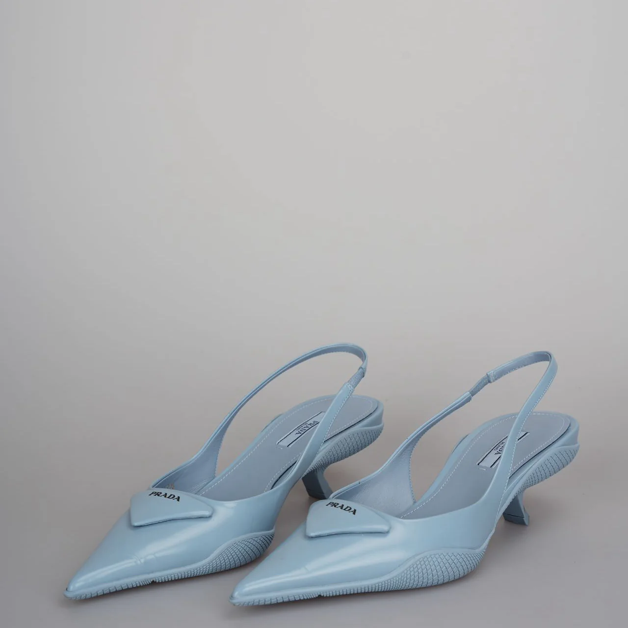 used-Prada Spazzolato Triangle Logo Pointed Toe Slingback Pumps size 37.5-MILOURA