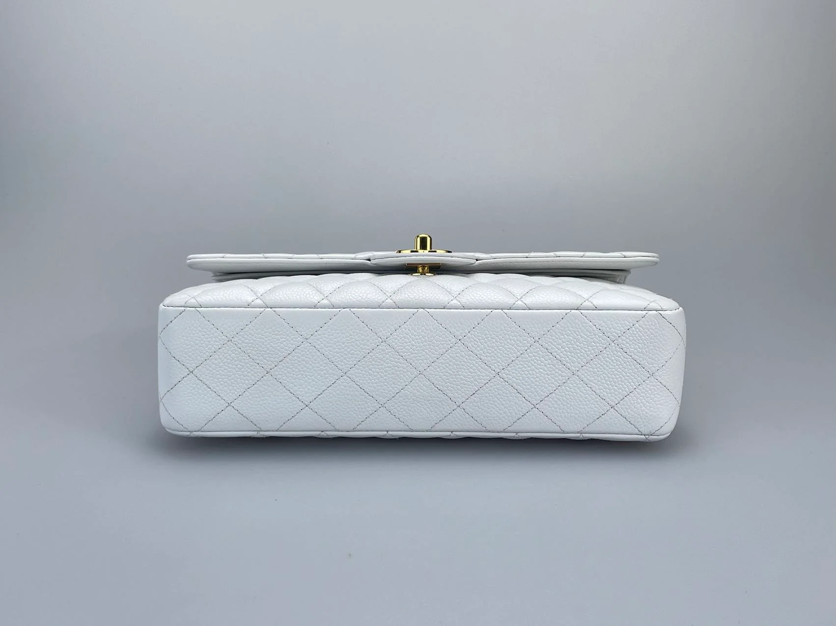 used-Chanel Medium White Classic Flap Bag in Caviar Leather with Gold Hardware-MILOURA