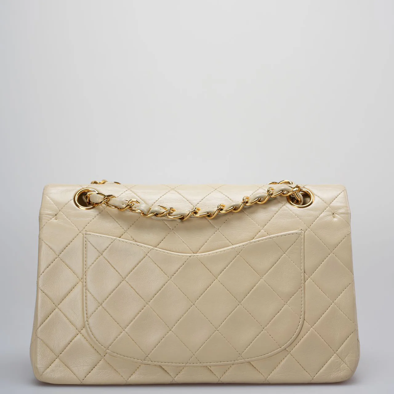 used-Chanel Vintage Beige Quilted Leather small timeless Double Flap Bag with 24K Gold Hardware-MILOURA