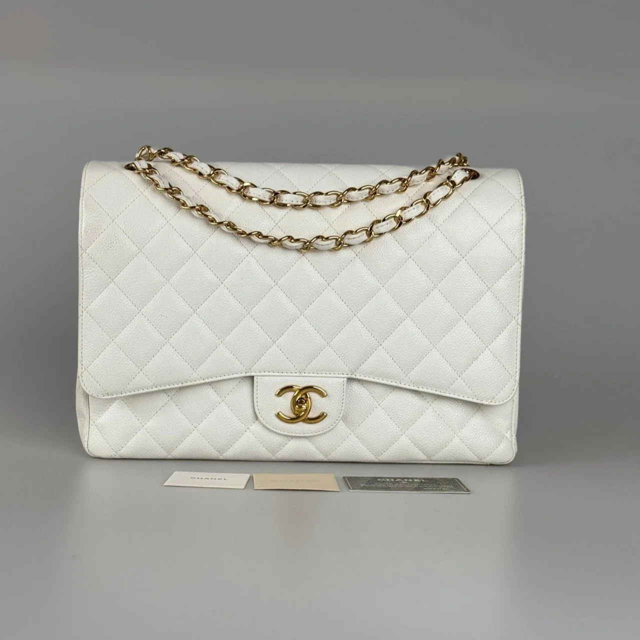 used-Chanel timeless flap Bag Caviar Leather Maxi size in white-MILOURA