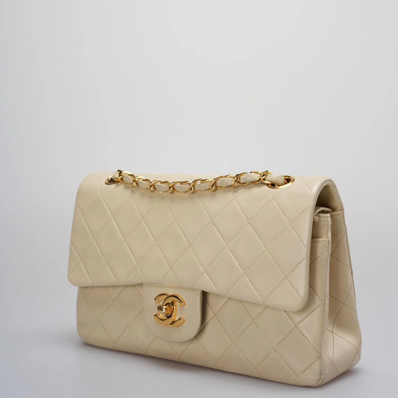 used-Chanel Vintage Beige Quilted Leather small timeless Double Flap Bag with 24K Gold Hardware-MILOURA