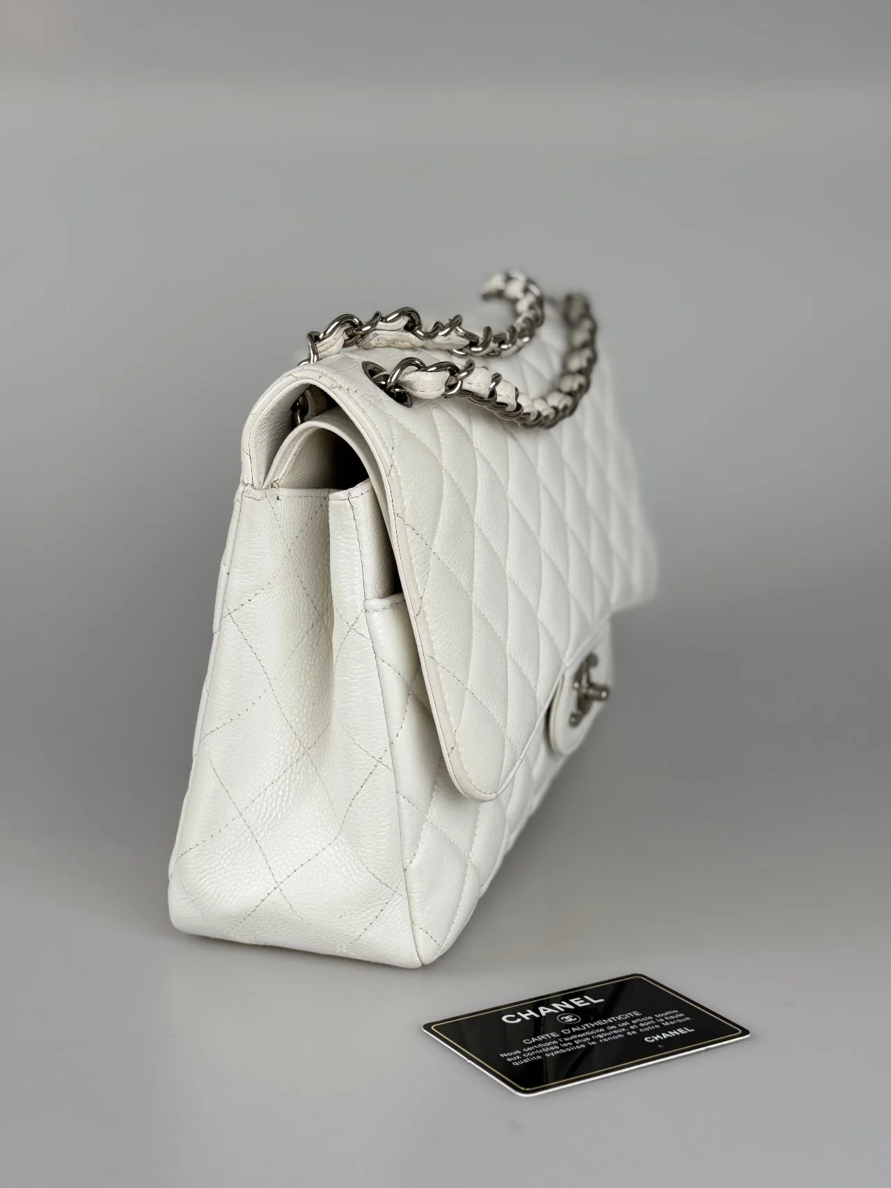 used-Chanel White Jumbo classic Double Flap Bag In Caviar Leather with silver Hardware-MILOURA