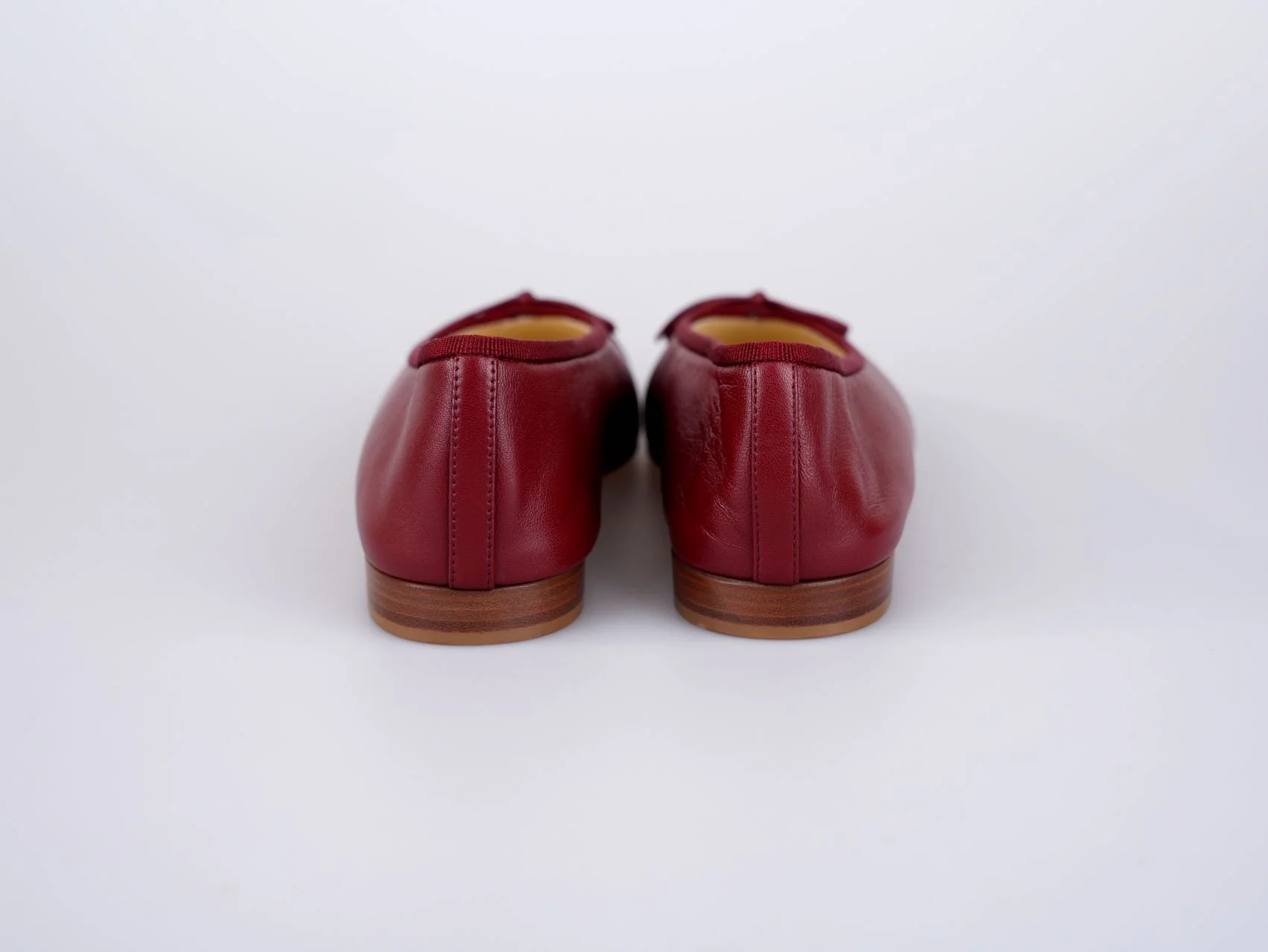 used-Chanel Burgundy Leather CC Bow Cap Toe Ballet Flats Size 38.5-MILOURA