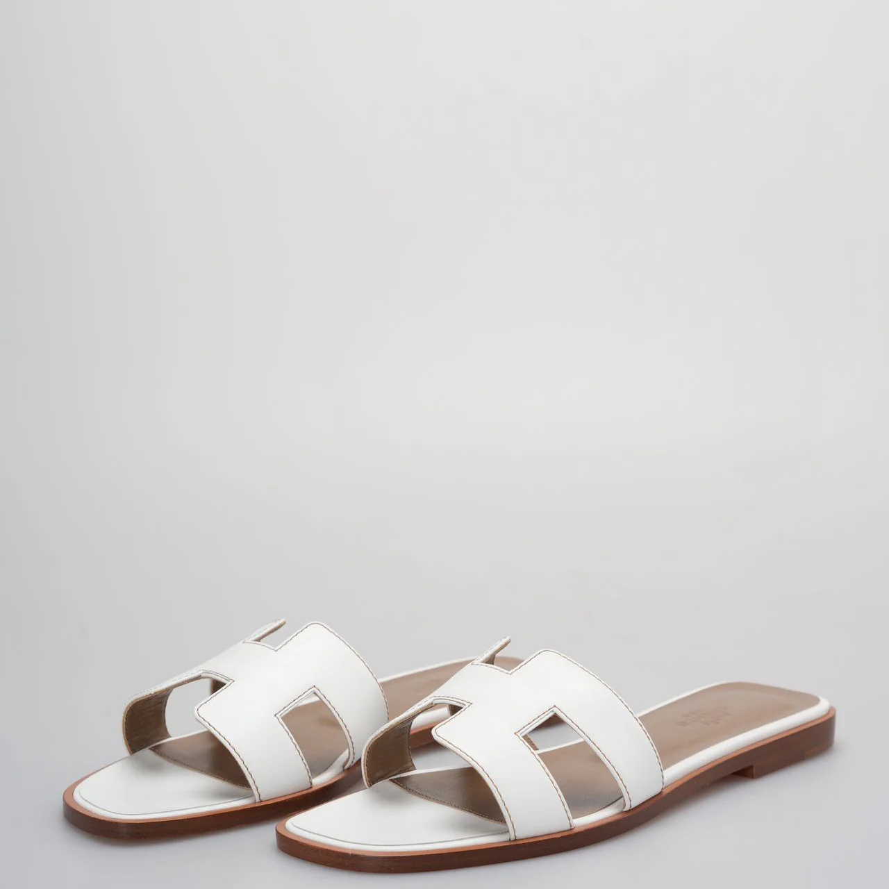 used-Hermes White Leather Oran Flats Sandals Size 36-MILOURA