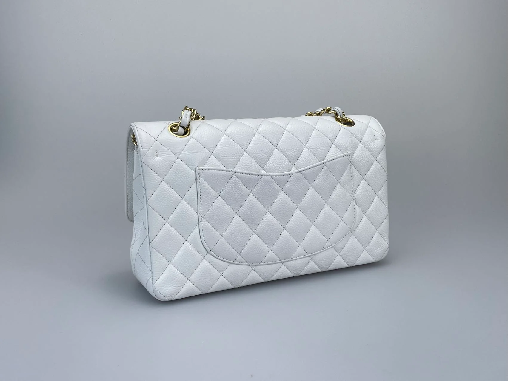 used-Chanel Medium White Classic Flap Bag in Caviar Leather with Gold Hardware-MILOURA