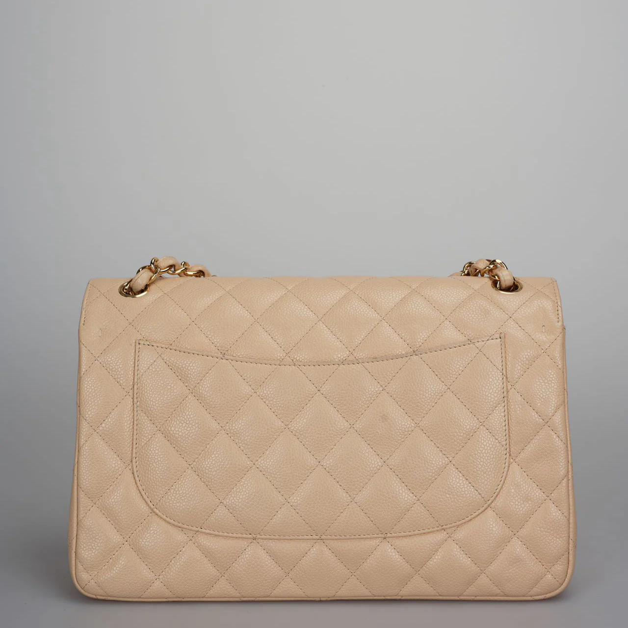 used-Chanel Beige Jumbo timeless Flap Bag Caviar Leather with Gold Hardware-MILOURA