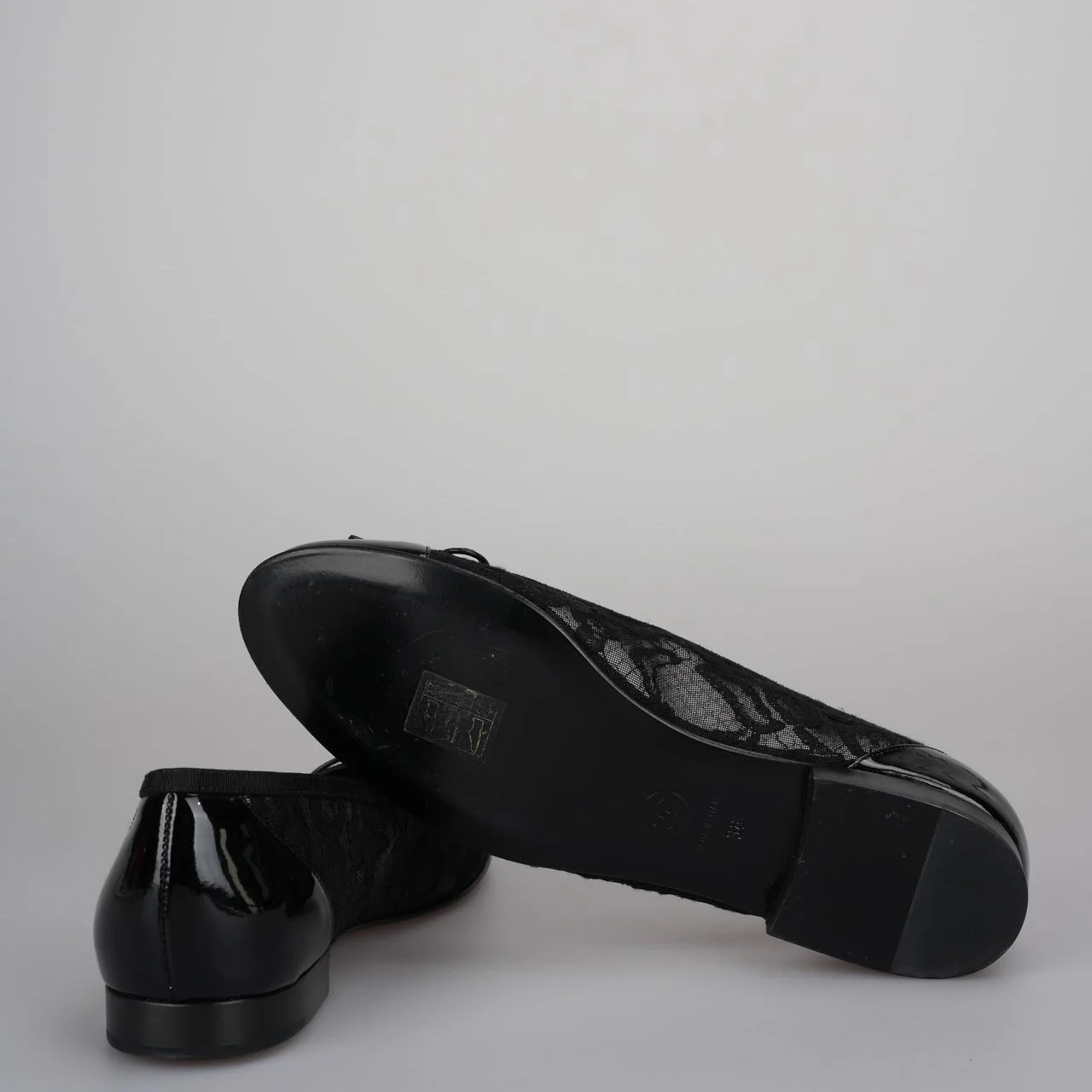 used-Chanel Black Lace and Patent Leather CC Bow Cap Toe Ballet Flats Size 38-MILOURA