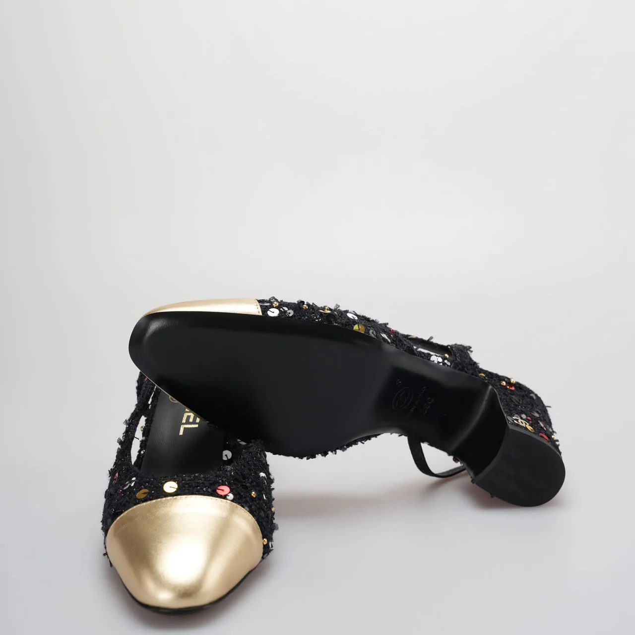 used-Chanel Tweed Lambskin Sequin Cap Toe CC Slingback Pumps size 39 in Black and Gold-MILOURA