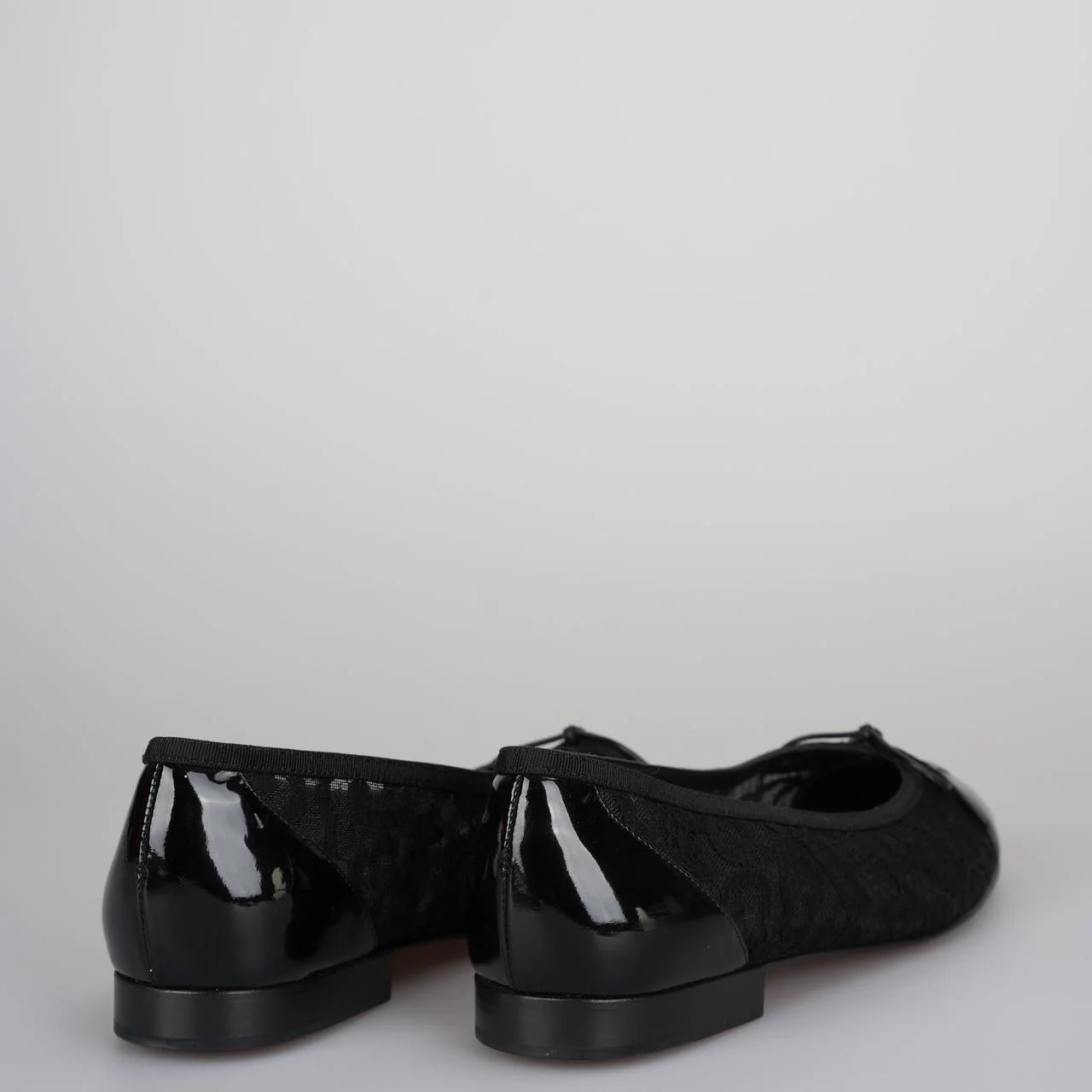 used-Chanel Black Lace and Patent Leather CC Bow Cap Toe Ballet Flats Size 38-MILOURA