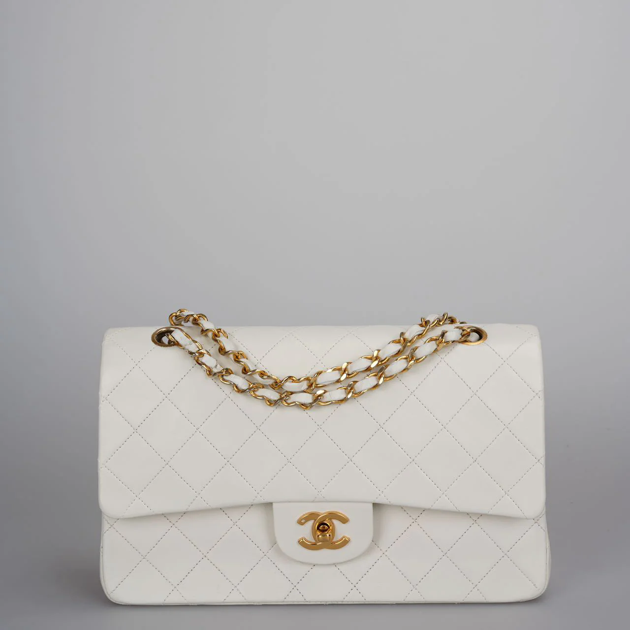 used-Chanel Vintage Small Timeless Classic Double Flap Bag in White Quilted Leather-MILOURA