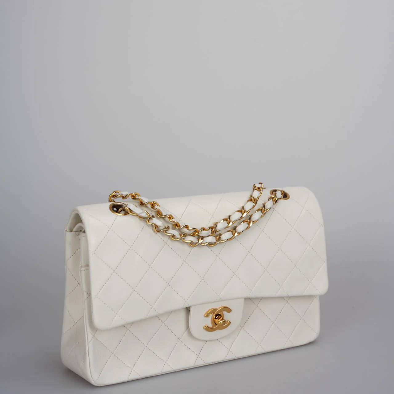 used-Chanel Vintage Small Timeless Classic Double Flap Bag in White Quilted Leather-MILOURA