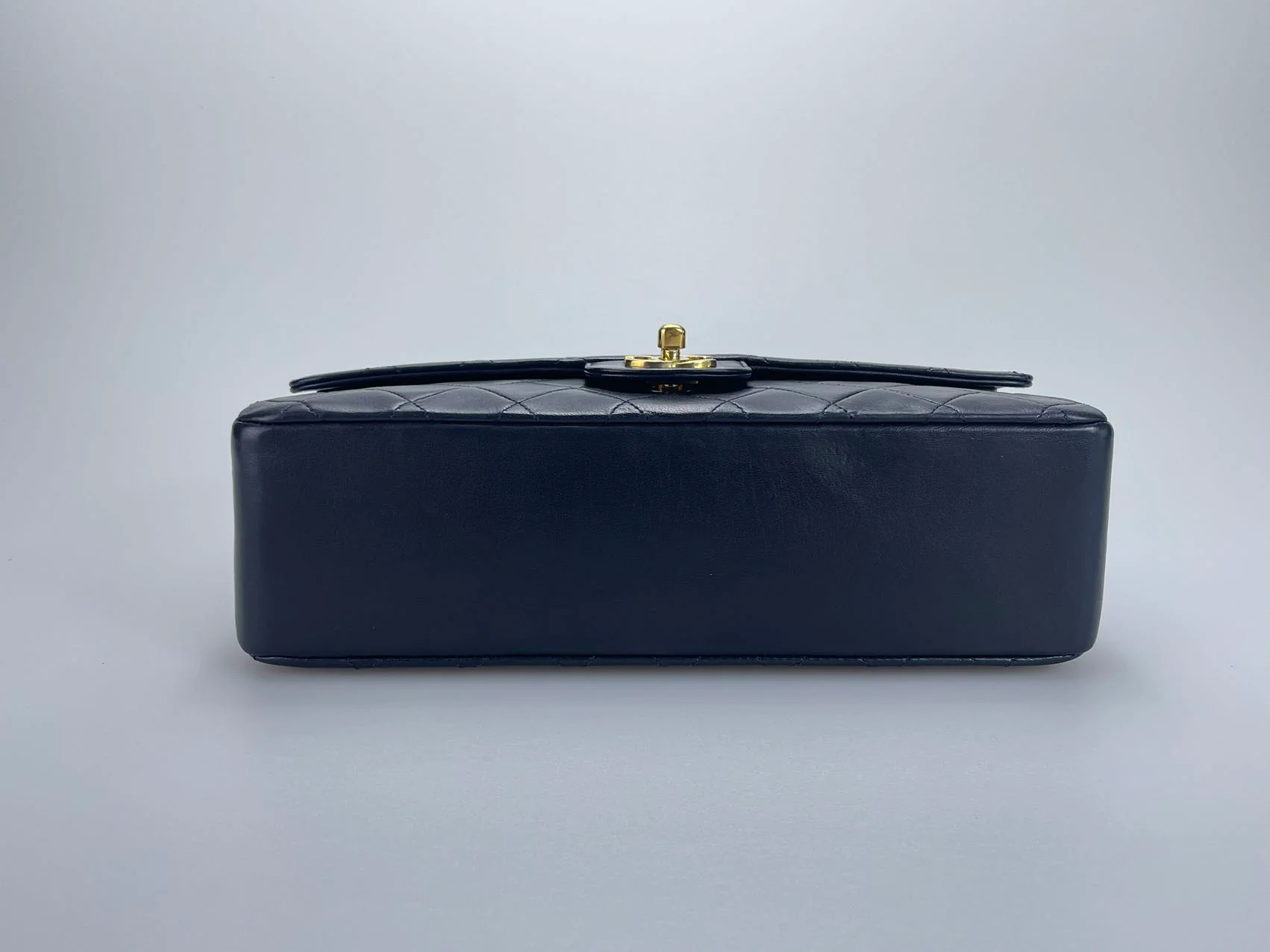 used-Chanel Black Vintage Medium Classic Double Flap Bag with 24K Gold Hardware-MILOURA