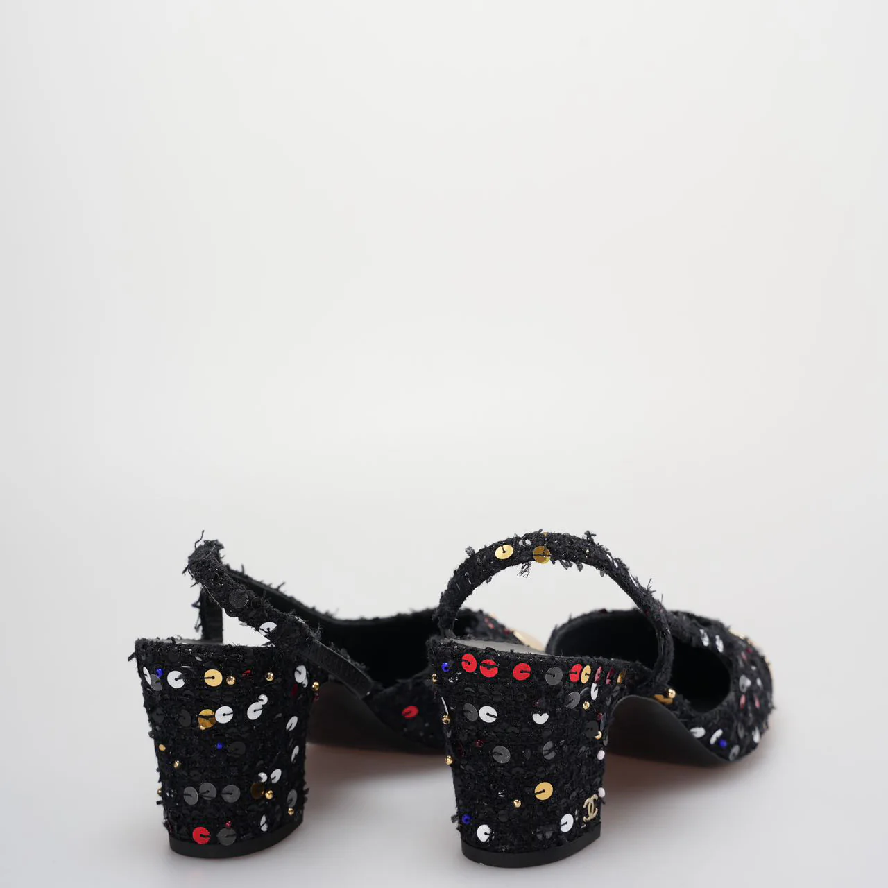 used-Chanel Tweed Lambskin Sequin Cap Toe CC Slingback Pumps size 39 in Black and Gold-MILOURA
