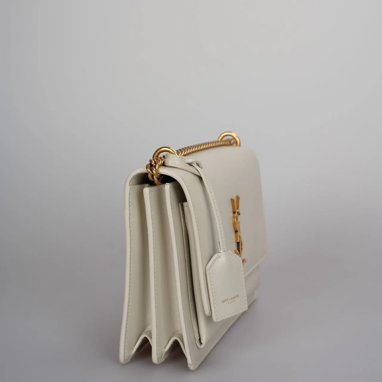 used-Saint Laurent Calfskin Medium Monogram Sunset in Blanc Vintage-MILOURA