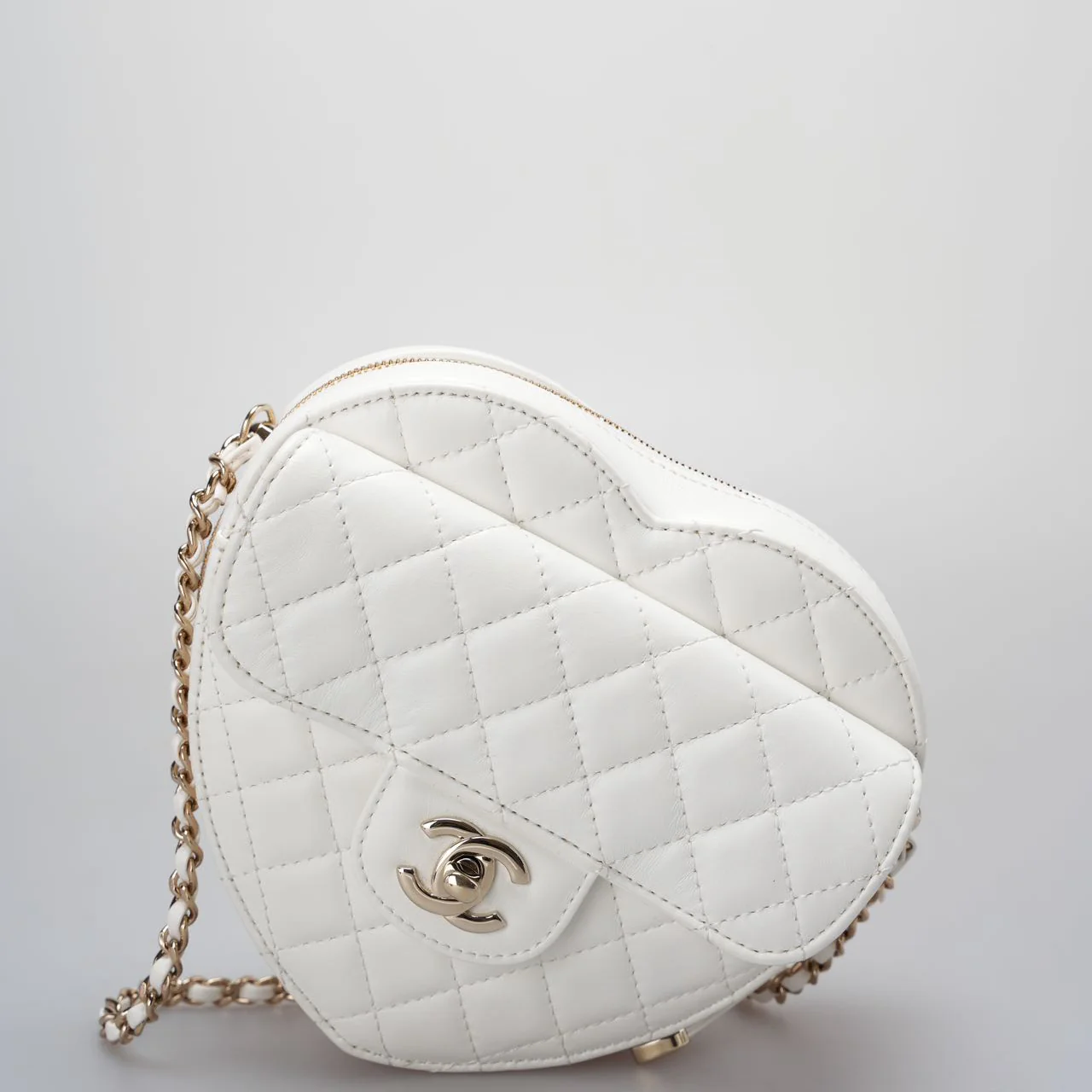 used-Chanel Heart Bag CC in Love Heart Clutch with Chain in White Lambskin with champagne Gold Hardware-MILOURA