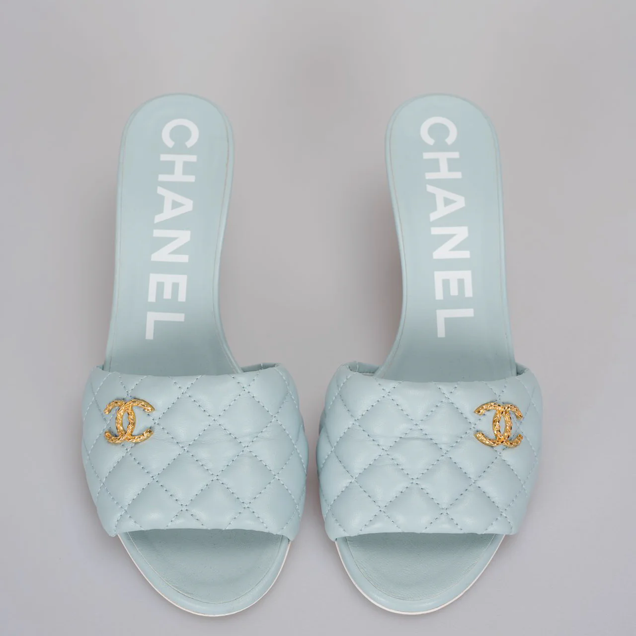 used-CHANEL Tiffany Blue Lambskin Quilted Textured CC Mules 38.5-MILOURA