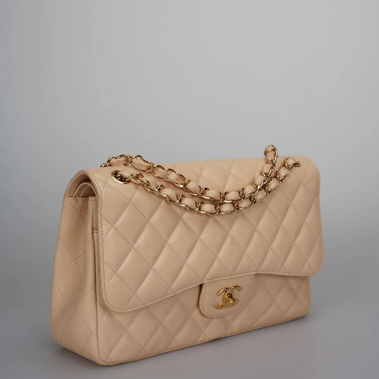 used-Chanel Beige Jumbo timeless Flap Bag Caviar Leather with Gold Hardware-MILOURA
