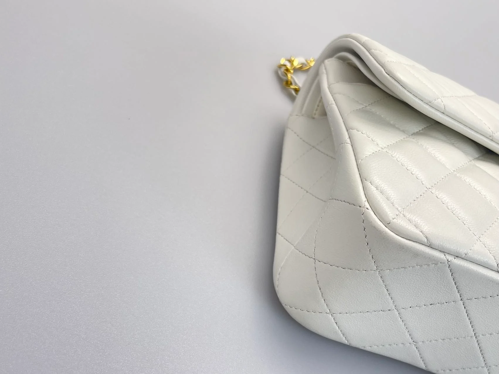 used-Chanel Vinateg White Classic Flap Bag with Gold Hardware-MILOURA