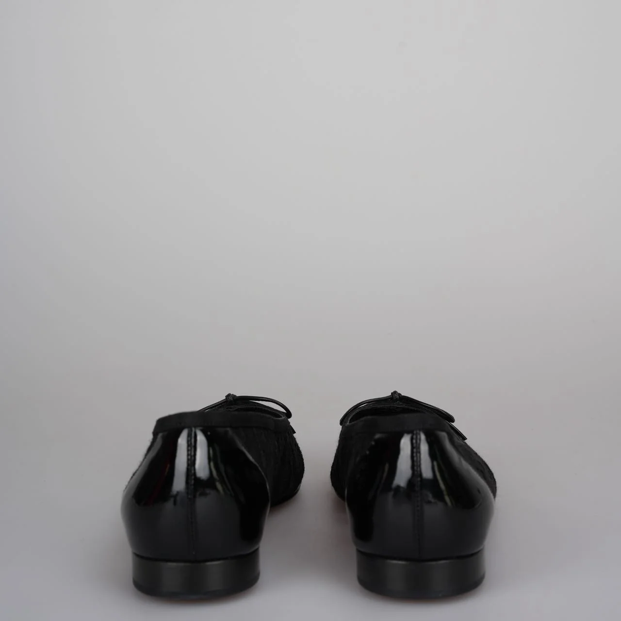 used-Chanel Black Lace and Patent Leather CC Bow Cap Toe Ballet Flats Size 38-MILOURA