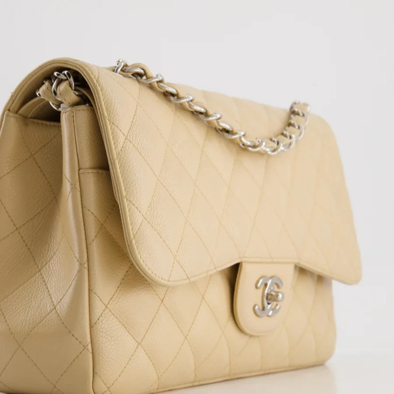 used-Chanel timeless Flap Bag Beige Jumbo size Caviar Leather with Silver Hardware-MILOURA