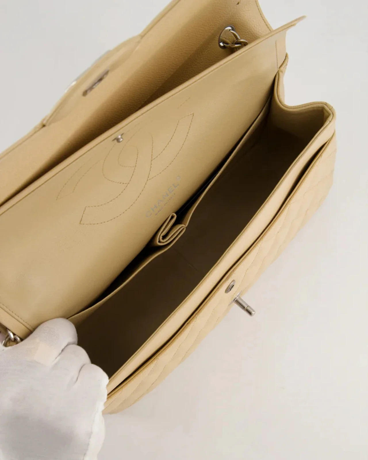 used-Chanel timeless Flap Bag Beige Jumbo size Caviar Leather with Silver Hardware-MILOURA