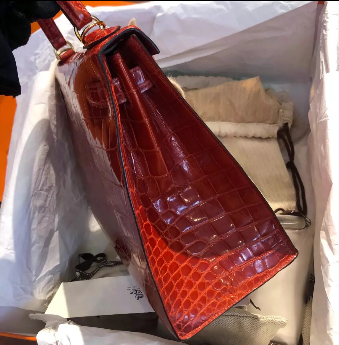 used-Hermes Kelly Bag 28cm in Sanguine Crocodile Niloticus Leather with Gold Hardware-MILOURA