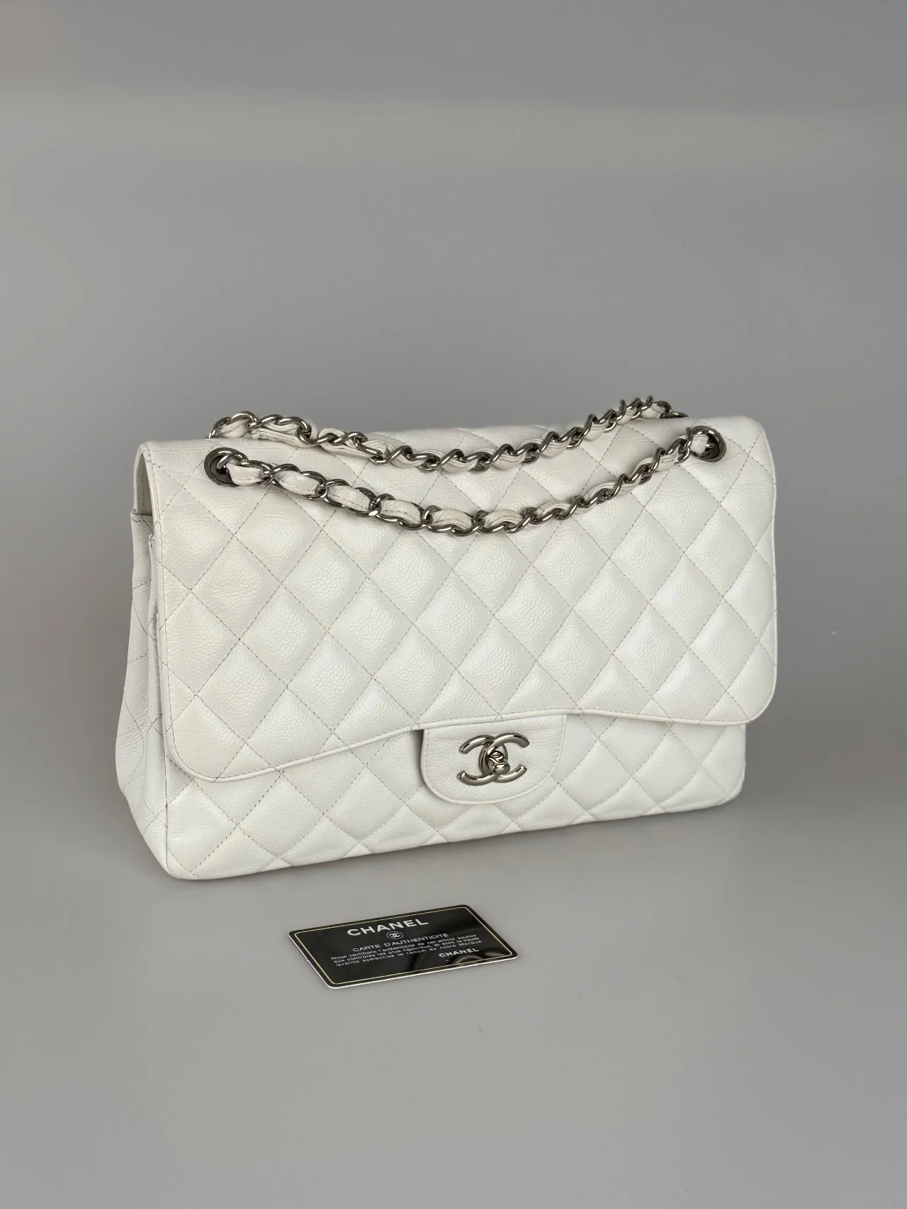 used-Chanel White Jumbo classic Double Flap Bag In Caviar Leather with silver Hardware-MILOURA