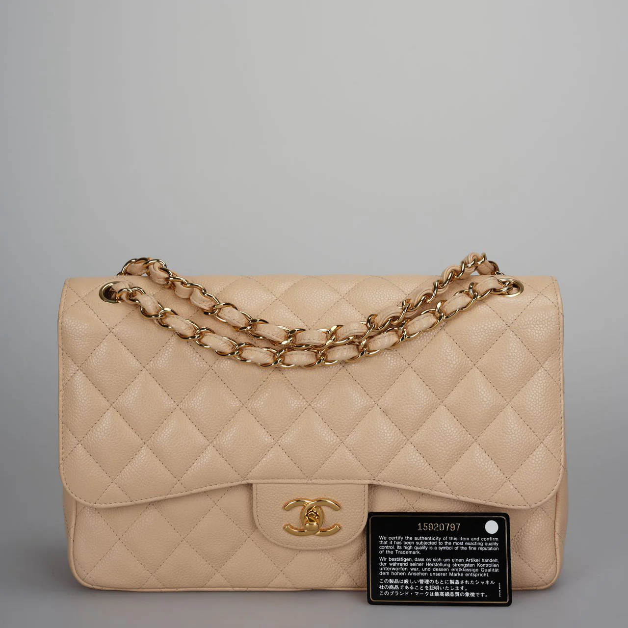 used-Chanel Beige Jumbo timeless Flap Bag Caviar Leather with Gold Hardware-MILOURA