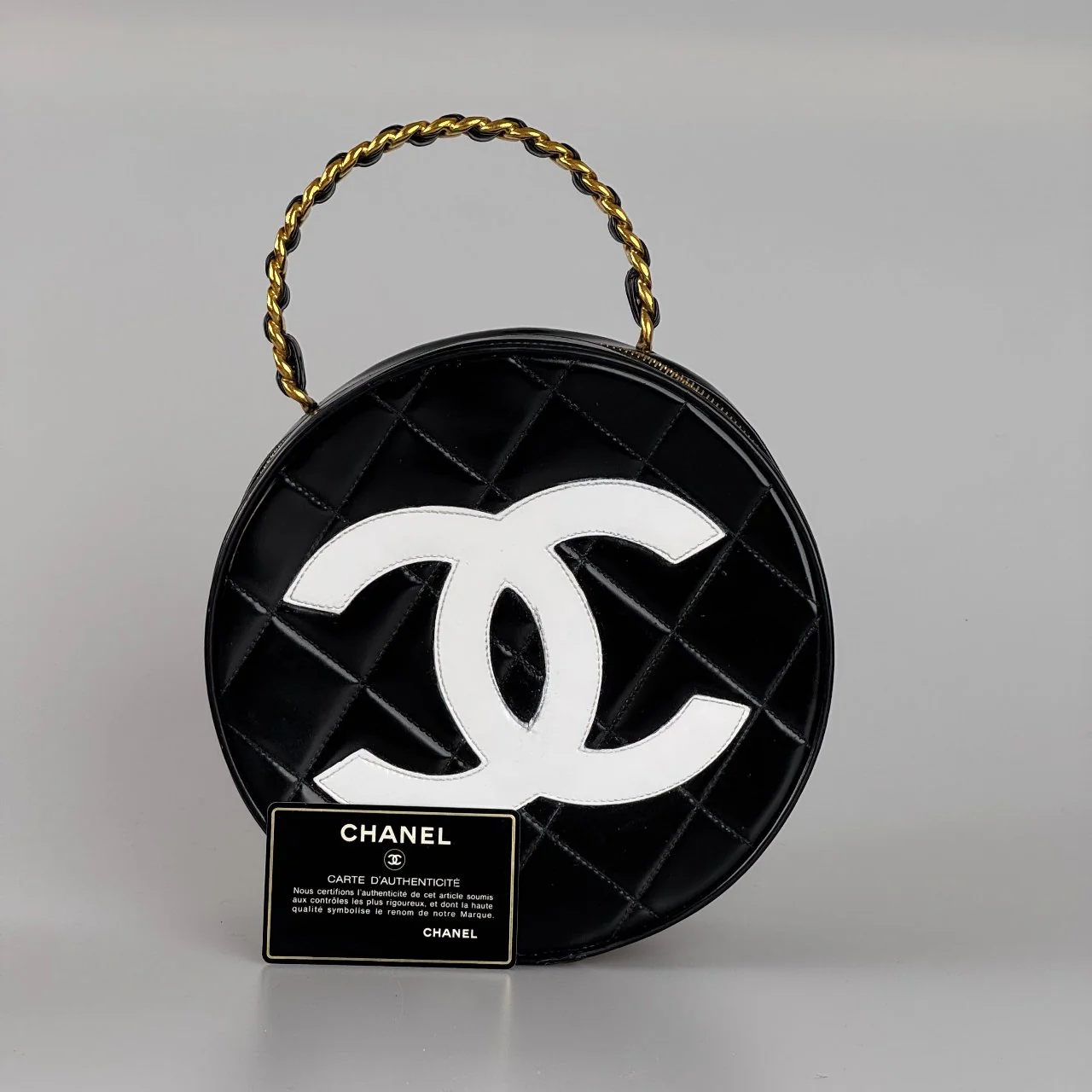 used-CHANEL 1995 BLACK ROUND VANITY CASE-MILOURA