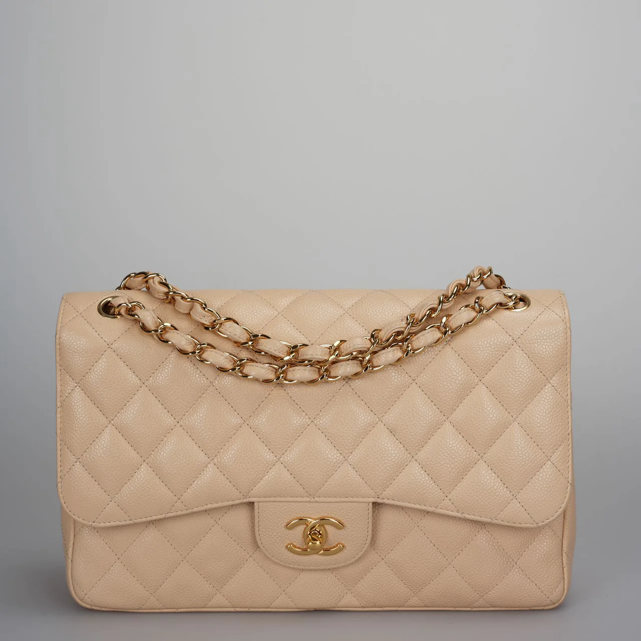 used-Chanel Beige Jumbo timeless Flap Bag Caviar Leather with Gold Hardware-MILOURA